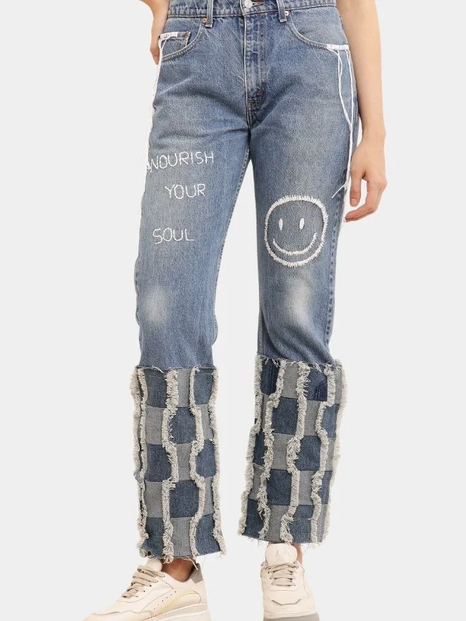 85 Embroidered Patchwork Levi’s Reworked Jeans - Image 1